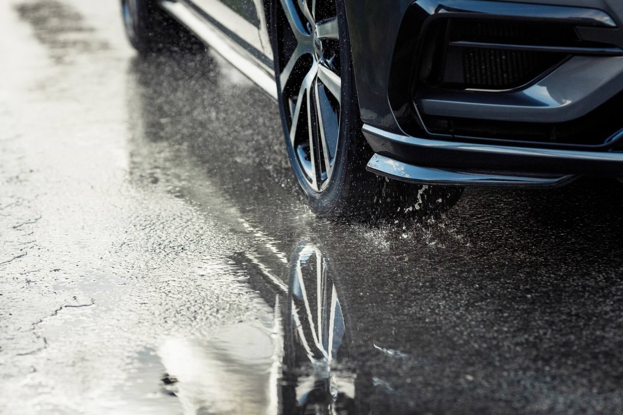 Car driving in the rain
