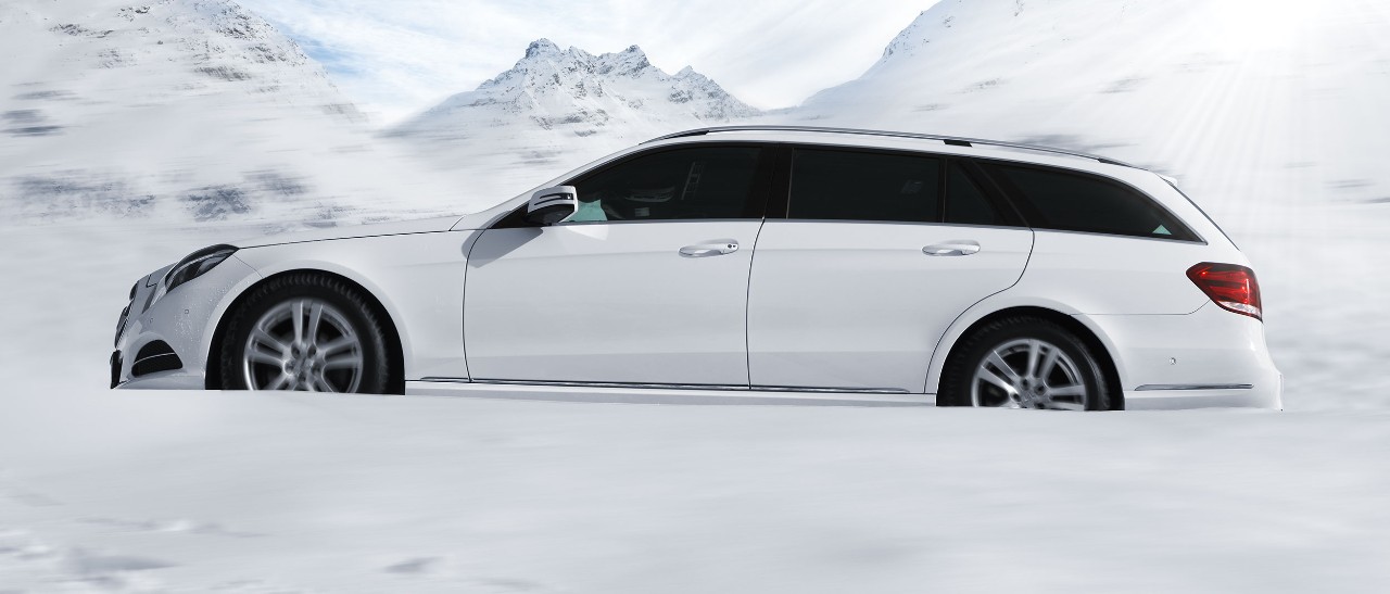 Car in wintery conditions with winter tyres fitted